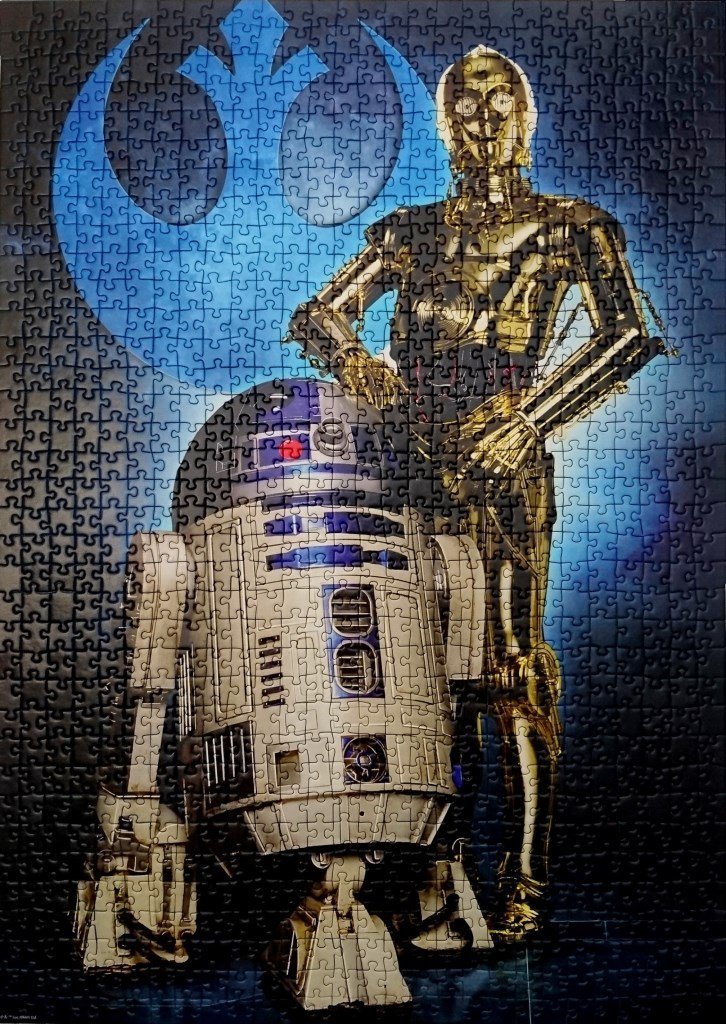 Puzzle 2019-9 Ravensburger - R2-D2 Cronicas